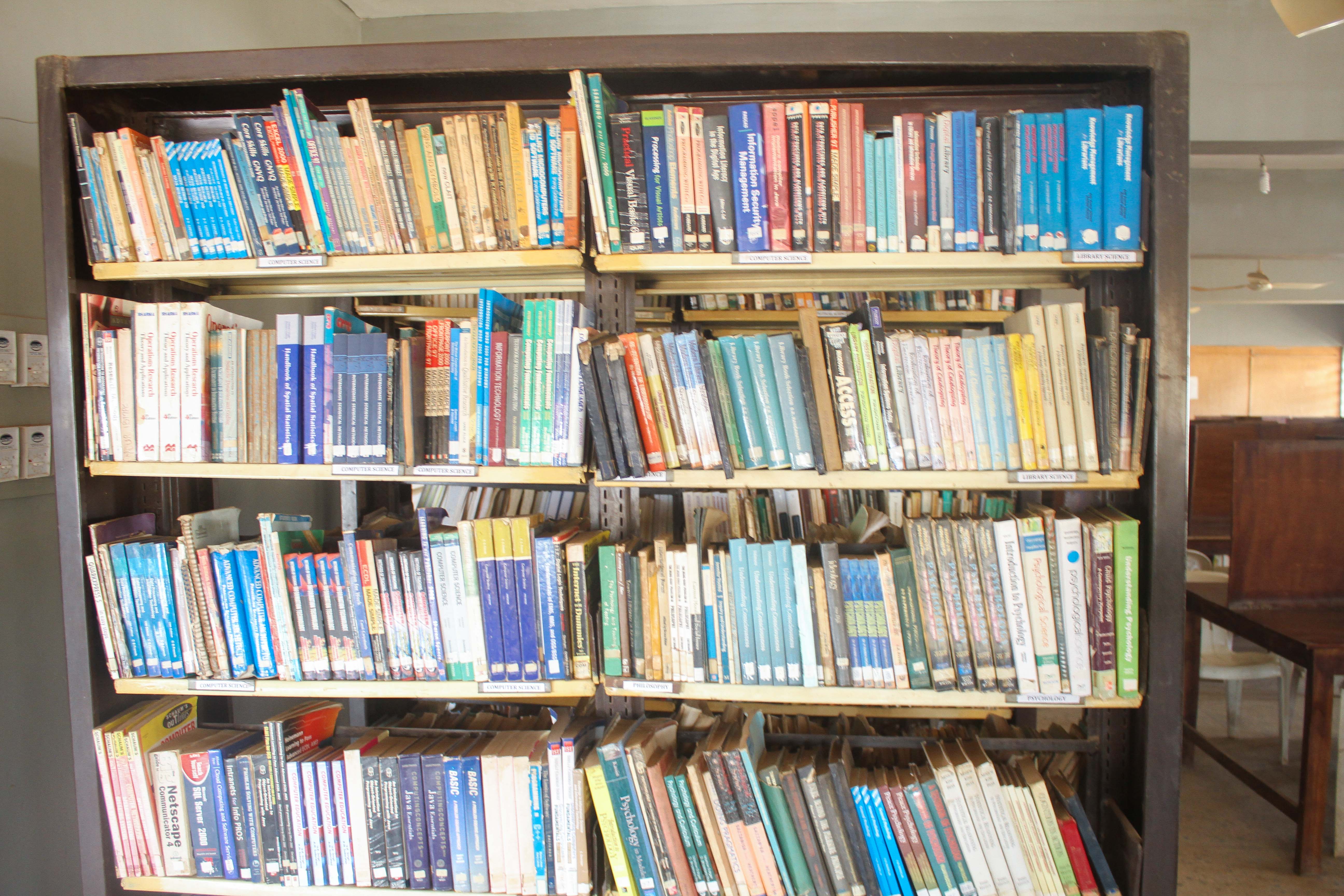 Book Shelf Containing different Categories of Books