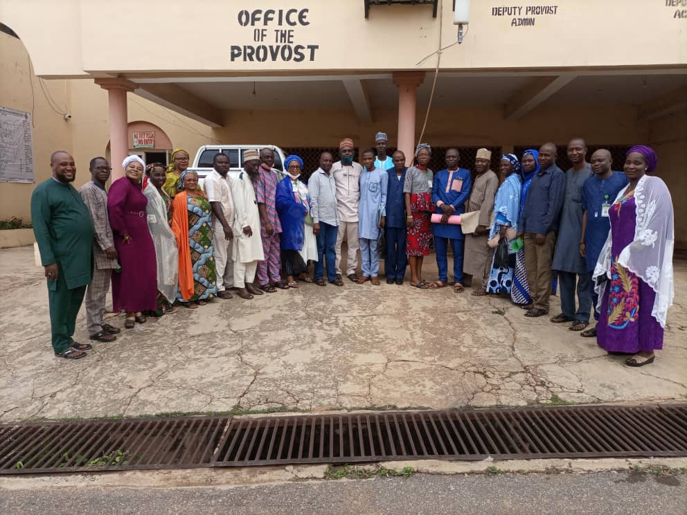 AG. REGISTRAR GROUP PHOTO WITH SCHOOL OFFICERS, ADMINISTRATIVE SECRETARIES